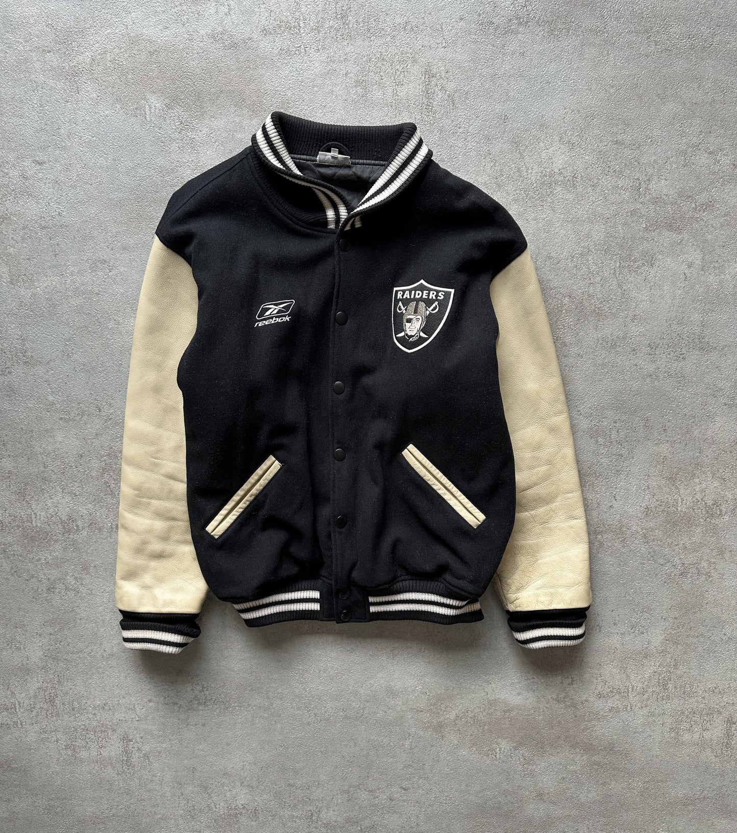 VINTAGE REEBOK OAKLAND RAIDERS VARSITY JACKET - XLARGE